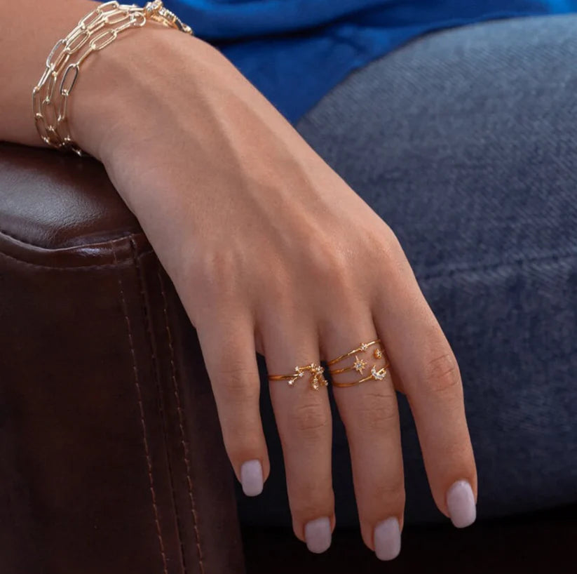 Balancing Moon and Star Paved Ring
