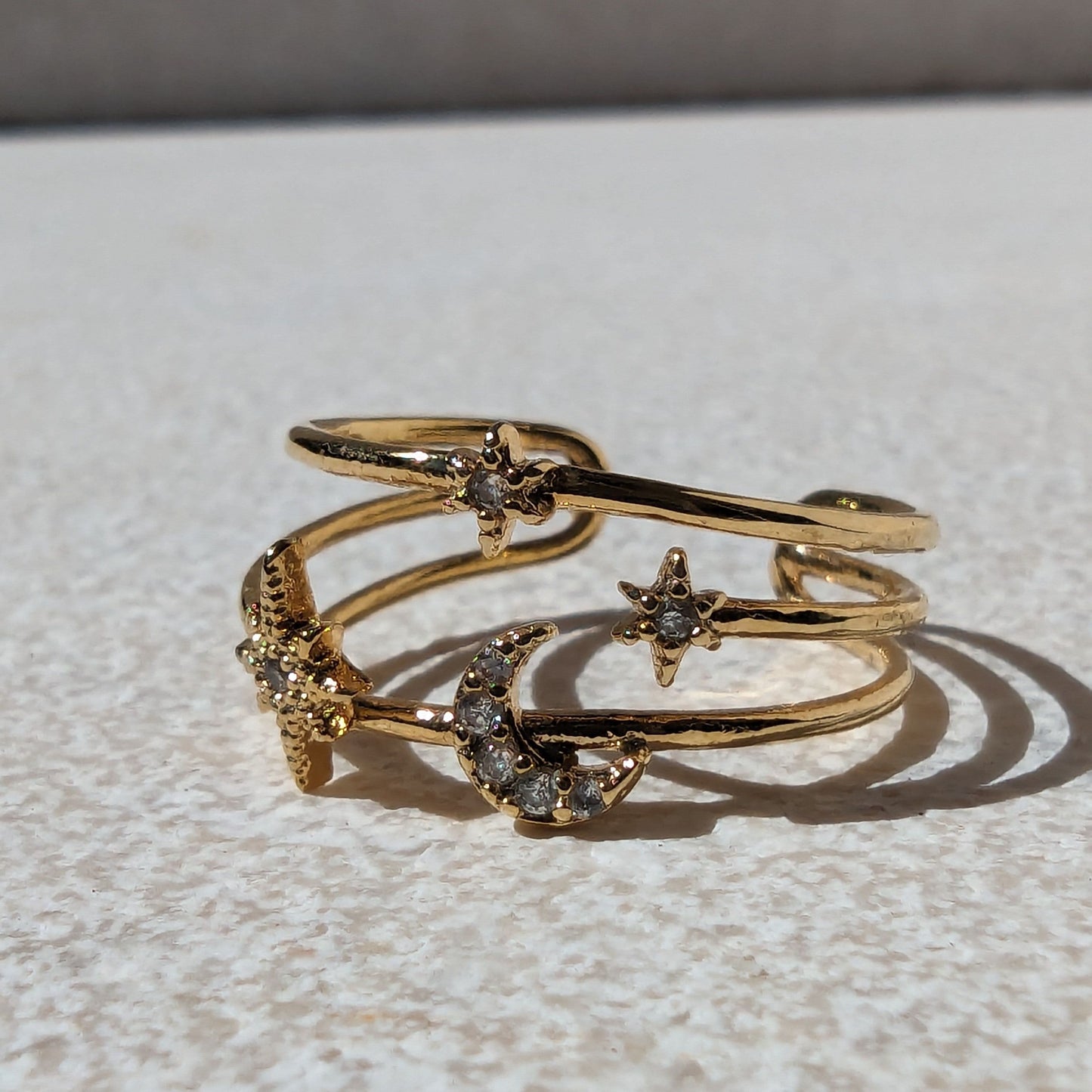 Balancing Moon and Star Paved Ring