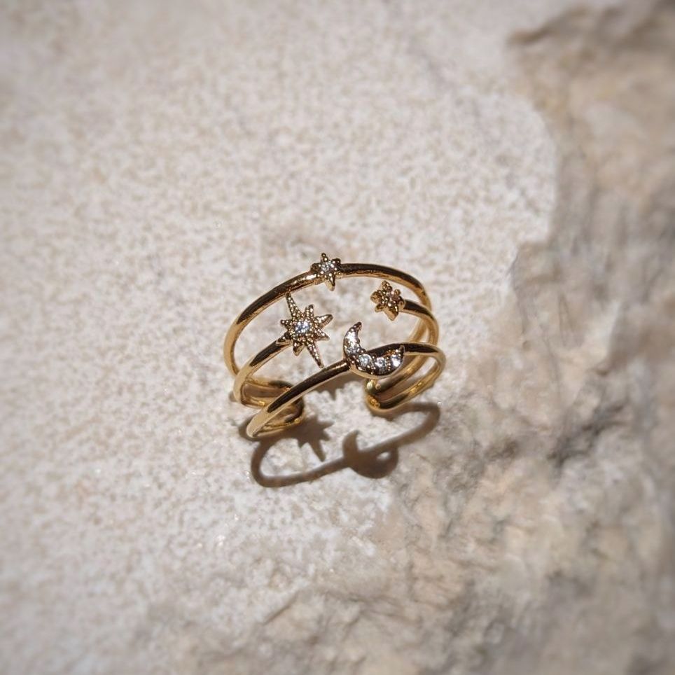 Balancing Moon and Star Paved Ring